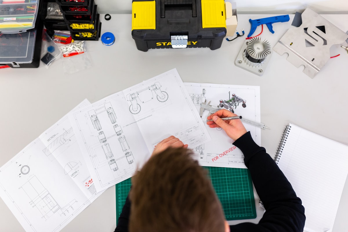 Engineer inspecting equipment during quality testing